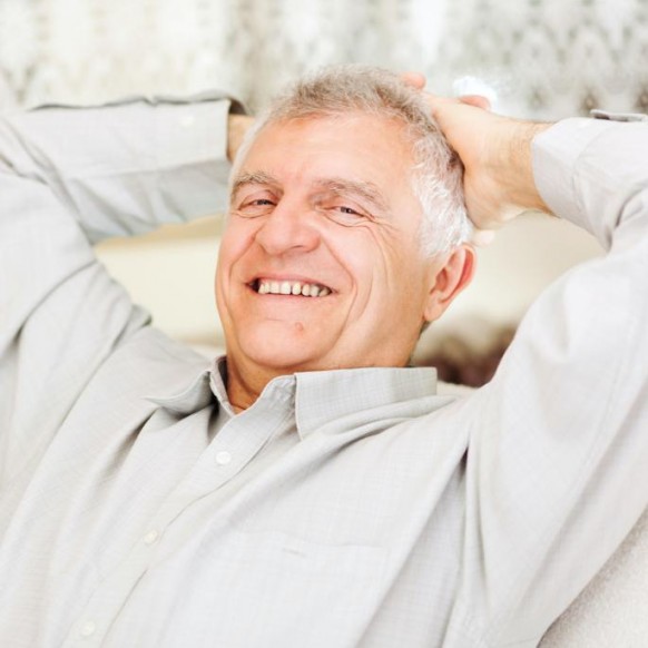 happy-senior-man-relaxing-at-home
